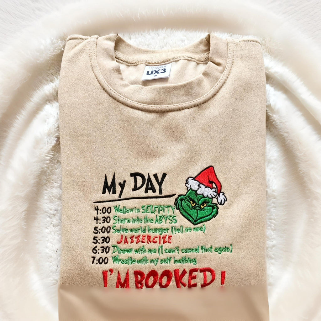 Christmas “I’m Booked” Grinch Embroidered Sweatshirt, Funny My Day Schedule Holiday Sweater, Cozy Winter Hoodie for Grinch Lovers, Festive Embroidery Gift Top