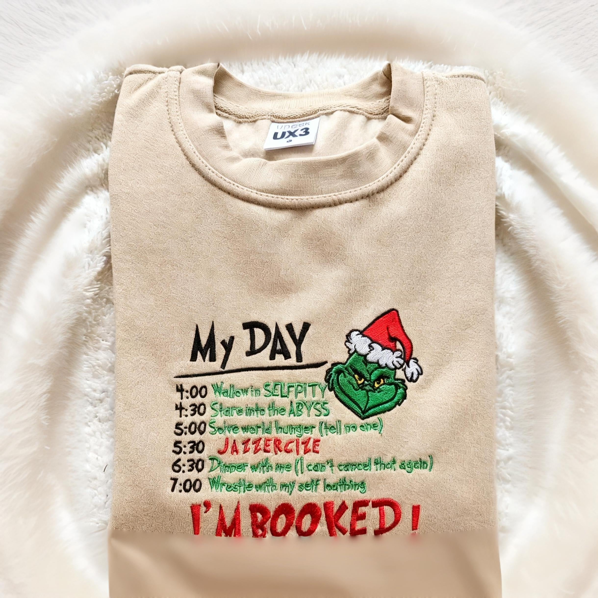 Christmas “I’m Booked” Grinch Embroidered Sweatshirt, Funny My Day Schedule Holiday Sweater, Cozy Winter Hoodie for Grinch Lovers, Festive Embroidery Gift Top