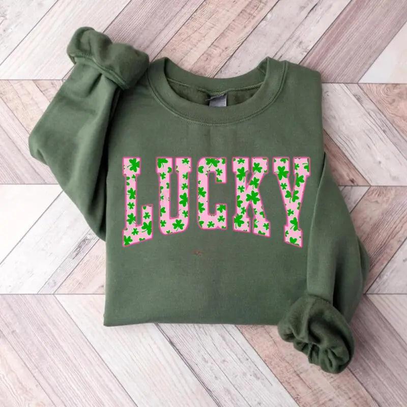 Lucky Clover sweatshirt with green shamrock design, perfect for St. Patrick’s Day, a cute Irish holiday shirt combining festive style and cozy comfort Shirt / Hoodie / Sweatshirt