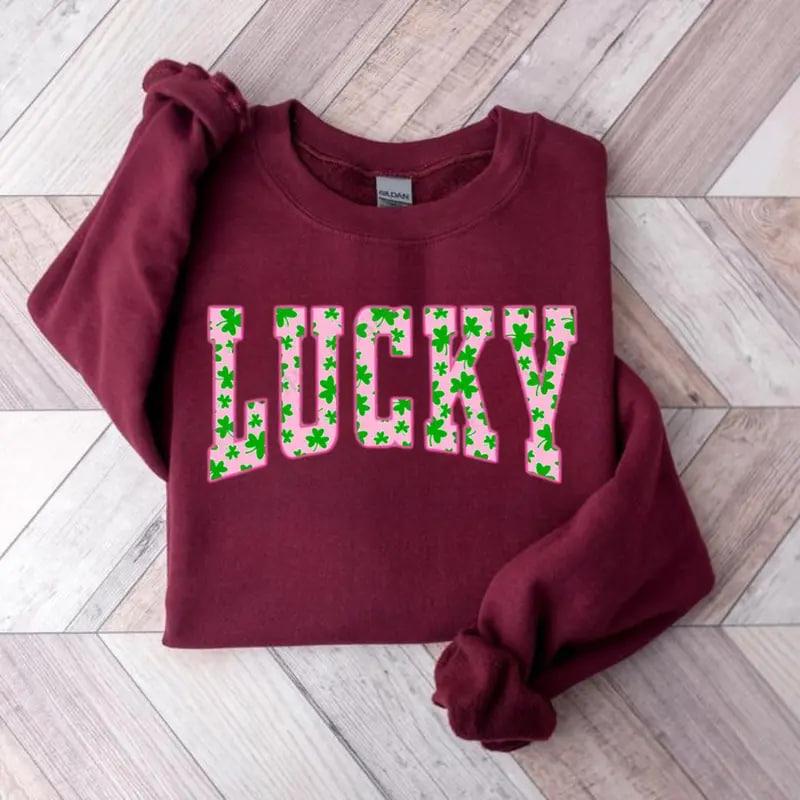Lucky Clover sweatshirt with green shamrock design, perfect for St. Patrick’s Day, a cute Irish holiday shirt combining festive style and cozy comfort Shirt / Hoodie / Sweatshirt
