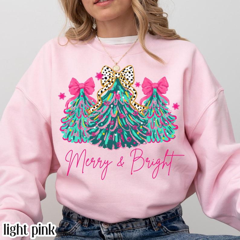 Christmas Sweatshirt Merry & Bright Xmas Tree, Pink Holiday Pullover with Festive Bow and Lights, Cute Jolly Tee, Merry Christmas Mom Crewneck Apparel Cotton
